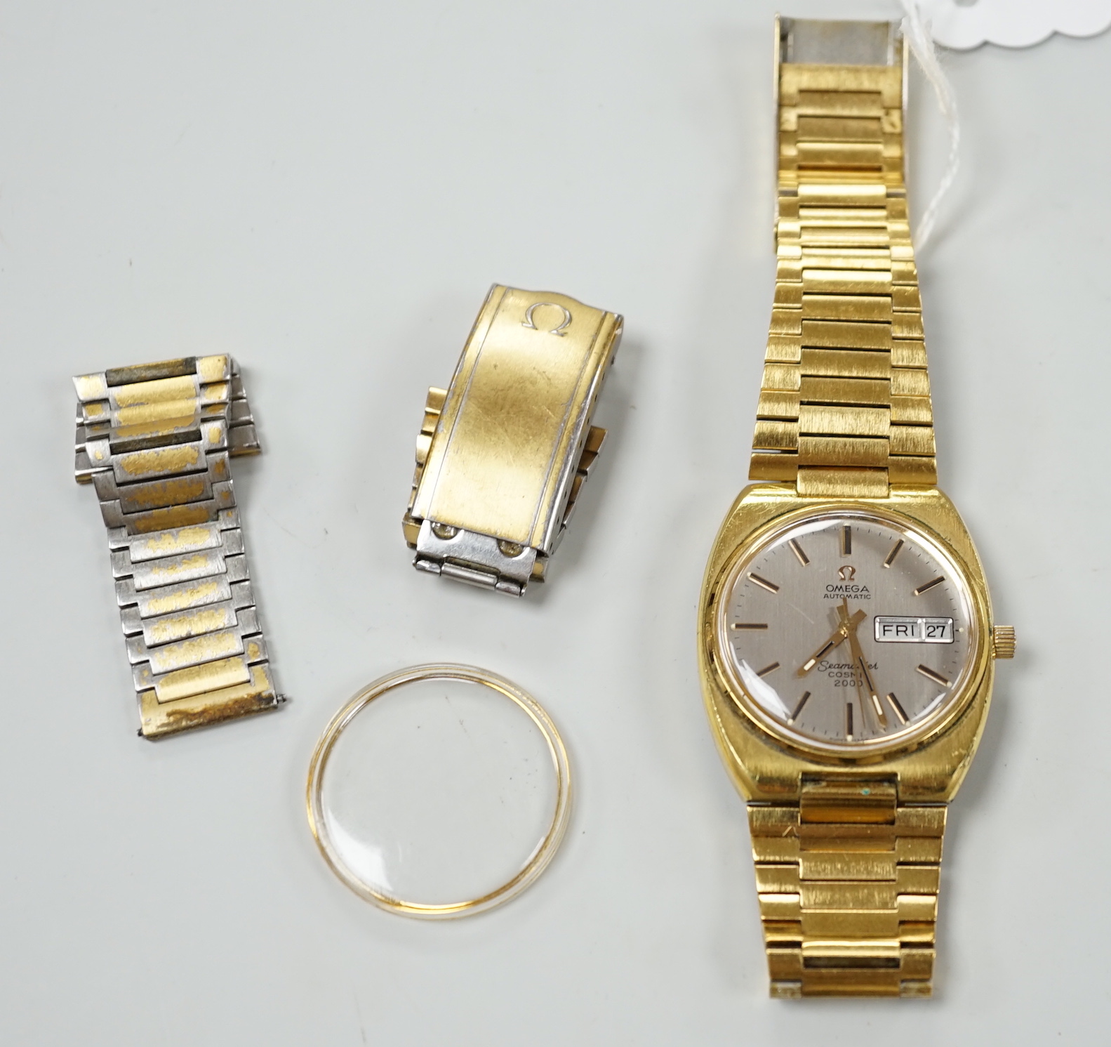 A gentleman's gold plated Omega Automatic Seamaster Cosmic 2000 wrist watch, on a steel and gold plated Omega bracelet.